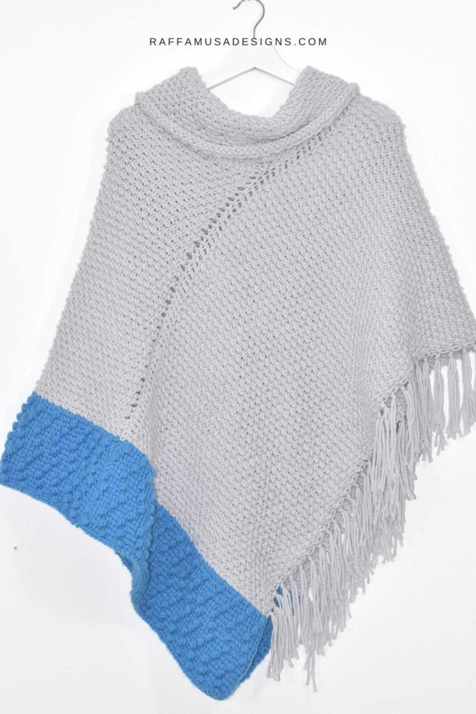 The Misty Grey Tunisian Crochet Poncho is the warm and cozy poncho that you'll want to wear this fall!
