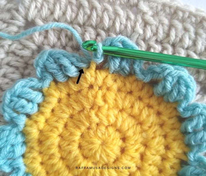 Join the petals round with a slip stitch into the initial slip stitch.
